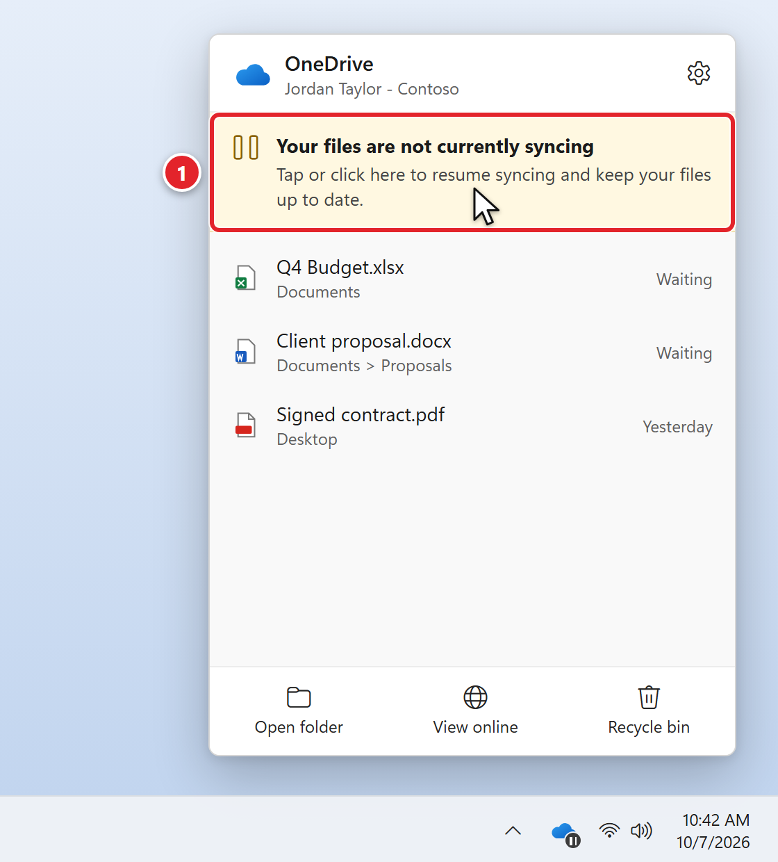 The OneDrive window opened from the cloud icon near the clock. At the top, a yellow banner reads Your files are not currently syncing, Tap or click here to resume syncing and keep your files up to date. The banner is marked 1. Two files below it show Waiting.