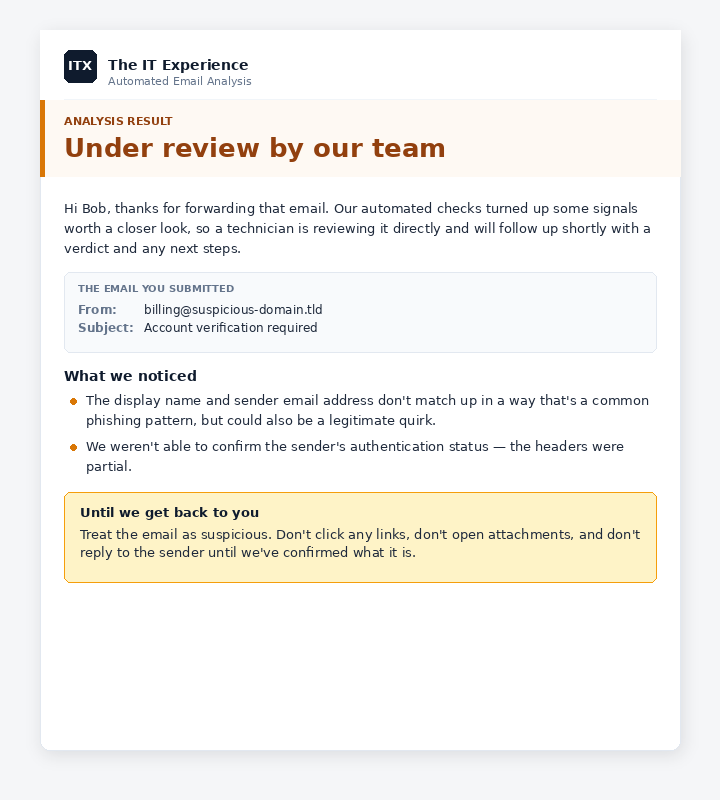 Sample reply email with an amber 'Under review by our team' banner, a short list of what the automated check noticed, and an amber note telling the user to treat the email as suspicious until we confirm what it is.