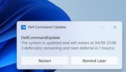 A Dell Command | Update notification near the clock: DellCommandUpdate. The system is updated and will restart at 04/09 22:08. 3 deferral(s) remaining and next deferral in 1 hour(s). Buttons: Restart and Remind Later.