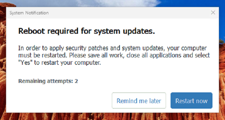 System Notification: Reboot required for system updates. Remind me later or Restart now